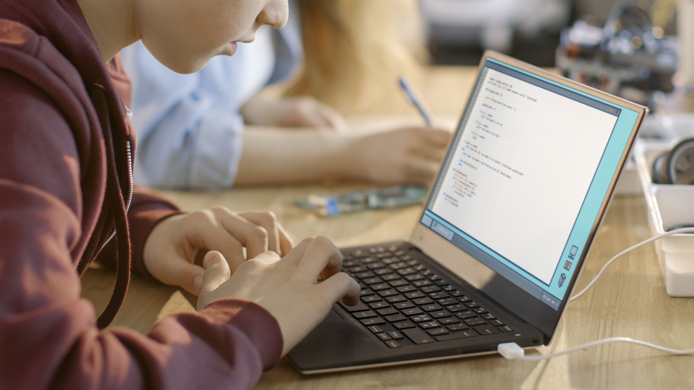 Student working on a laptop.